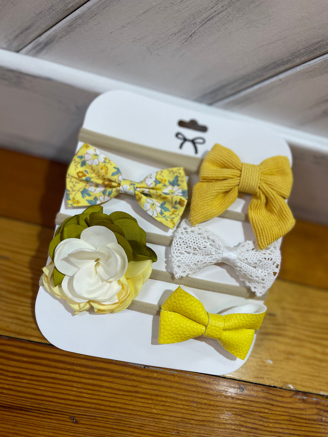 yellow infant bows